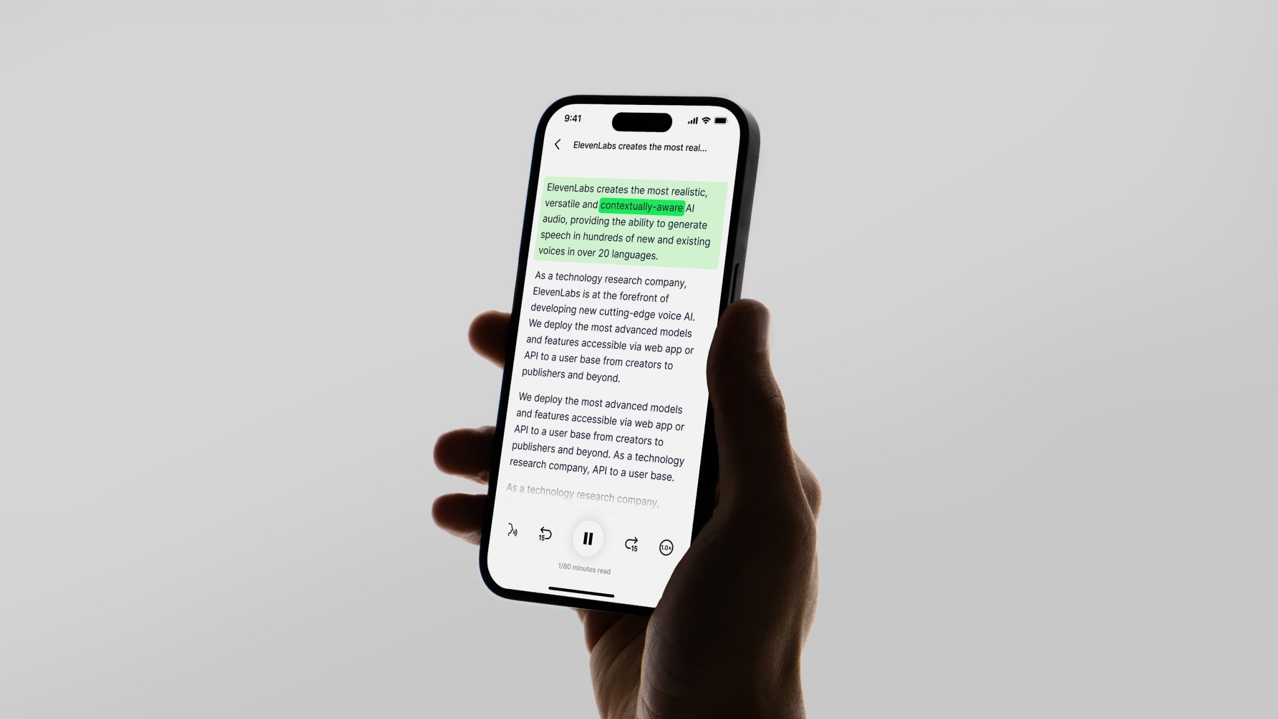 A hand holding a smartphone displaying a text conversation or article with highlighted green text.